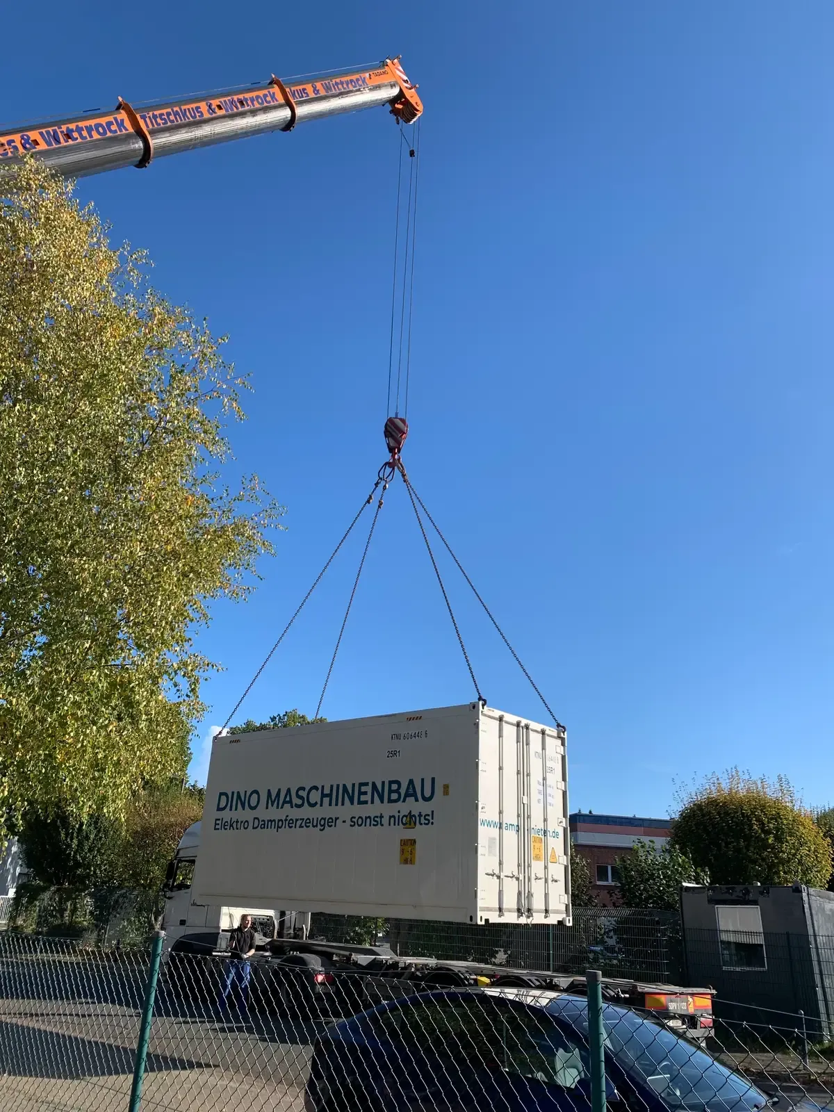 DINO container solution on the crane during delivery