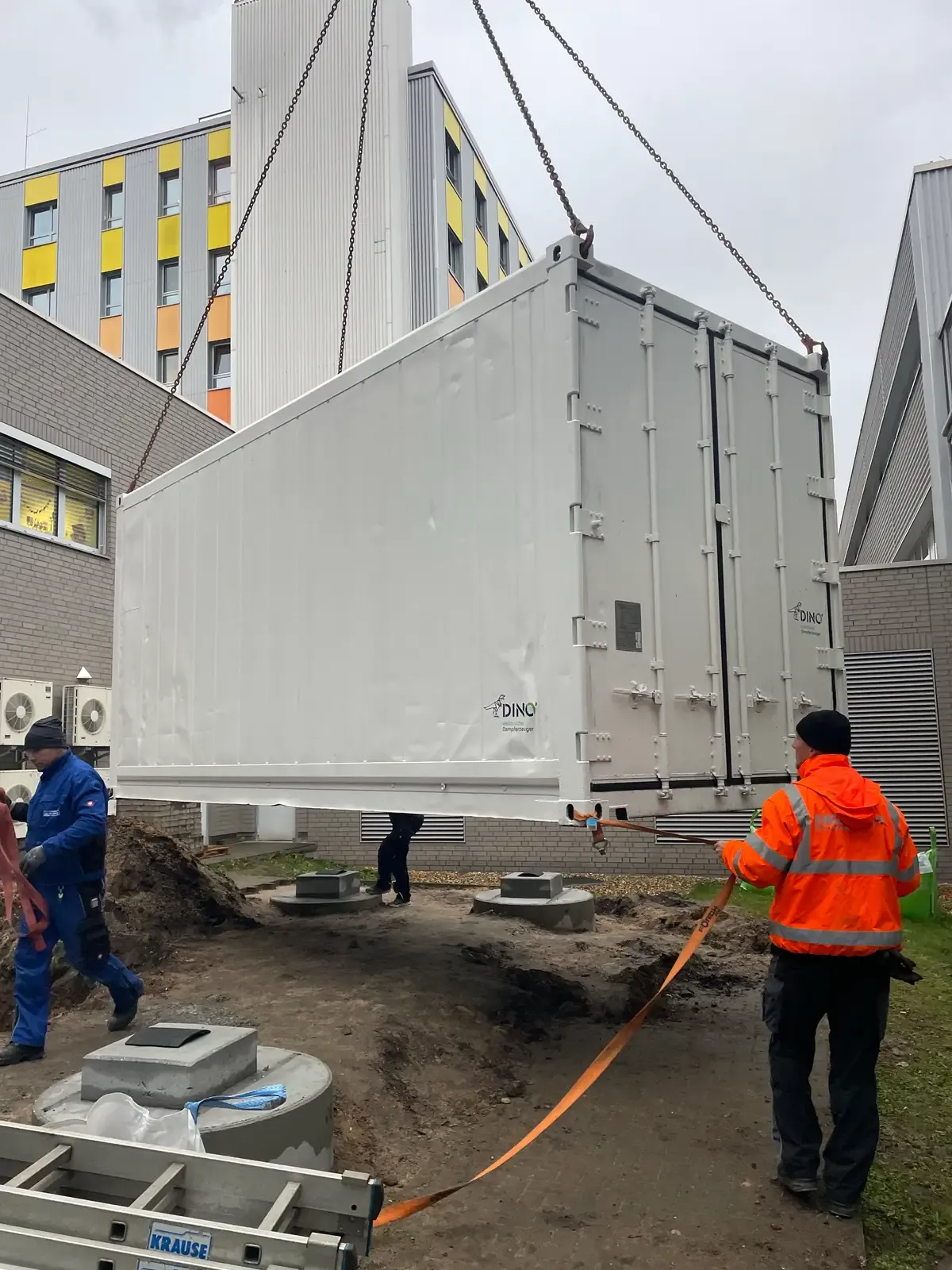 DINO container solution being positioned on site during installation